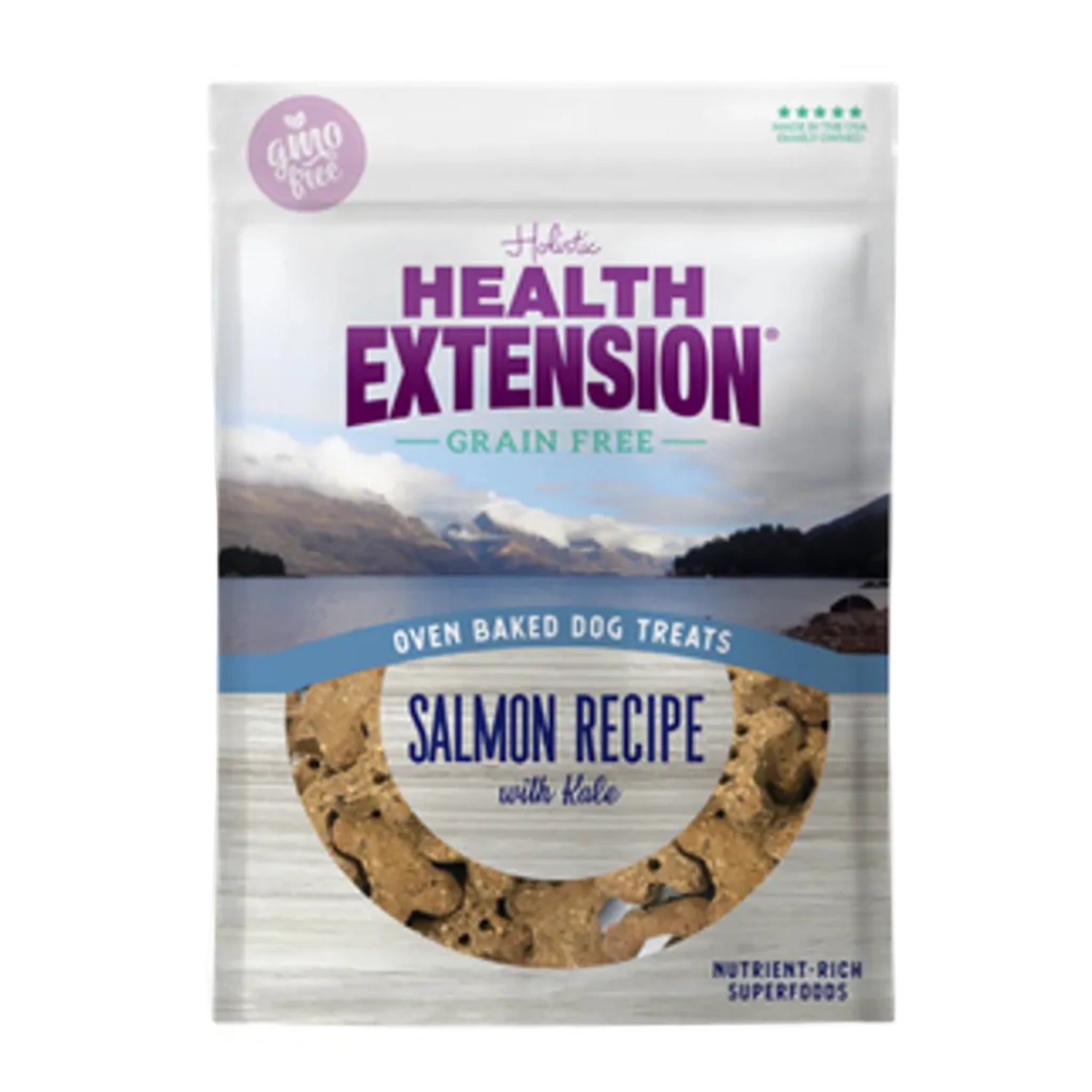 Health Extension grain-free oven baked dog treats salmon recipe packaging with scenic background